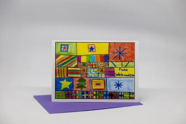 Weihnachtskarte: Geschenke mit Rentieren