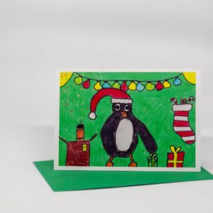 Weihnachtskarte: Pinguin mit Nikolausmütze