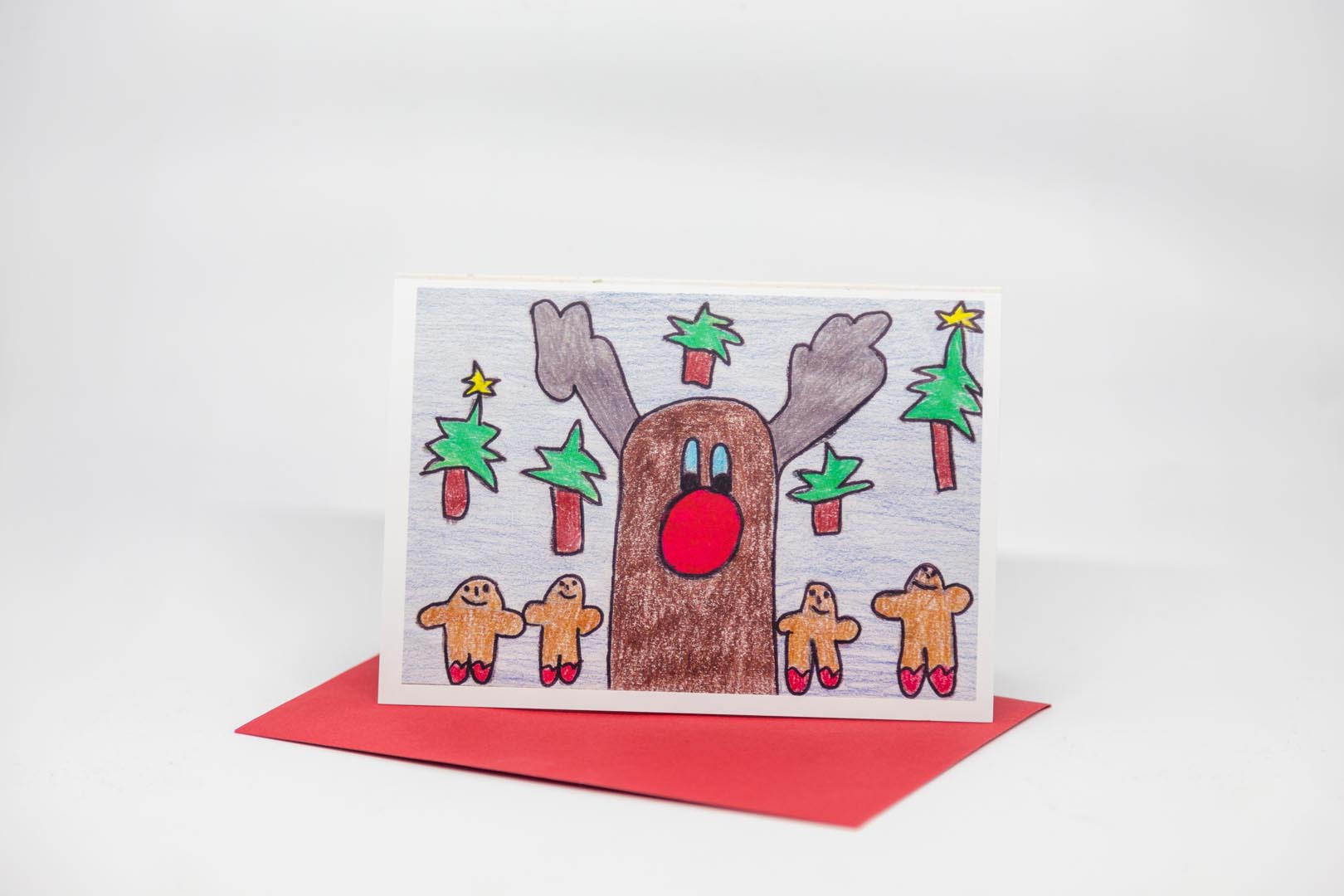 Weihnachtskarte: Rentier mit Lebkuchen