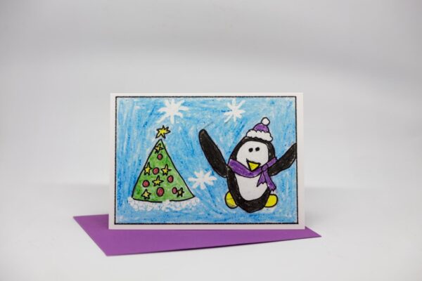 Weihnachtskarte: Pinguin mit Weihnachtsbaum